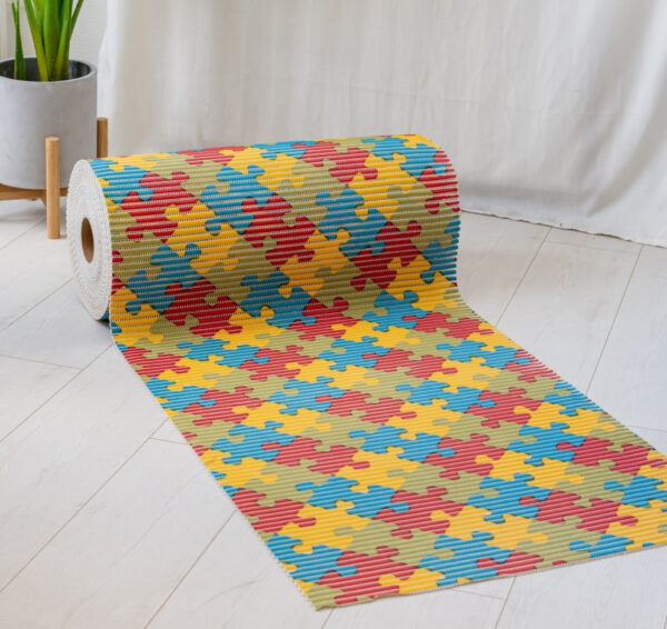 Fürdőszoba szőnyeg PVC színes puzzle 65cm széles